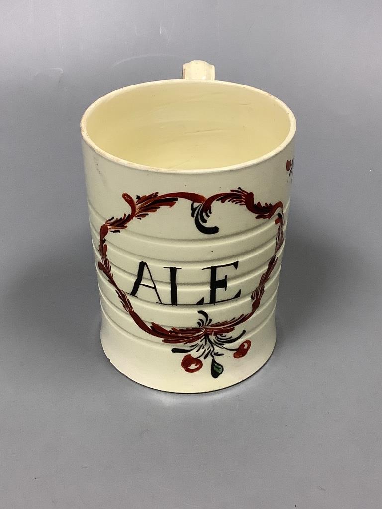 A creamware ‘ALE’ mug, c.1780, height 9.5cm